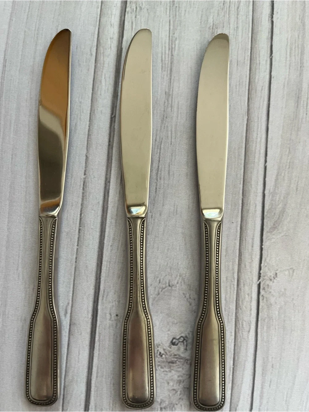 One set of 3 vintage Salem 1776 stainless steel beaded edge butter knives.